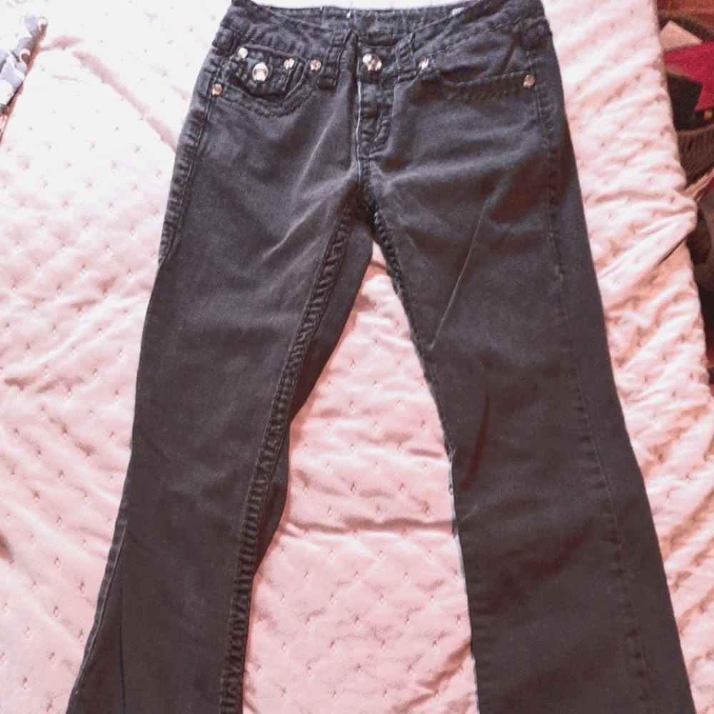 Pair of women's size 7 black boot cut jeans